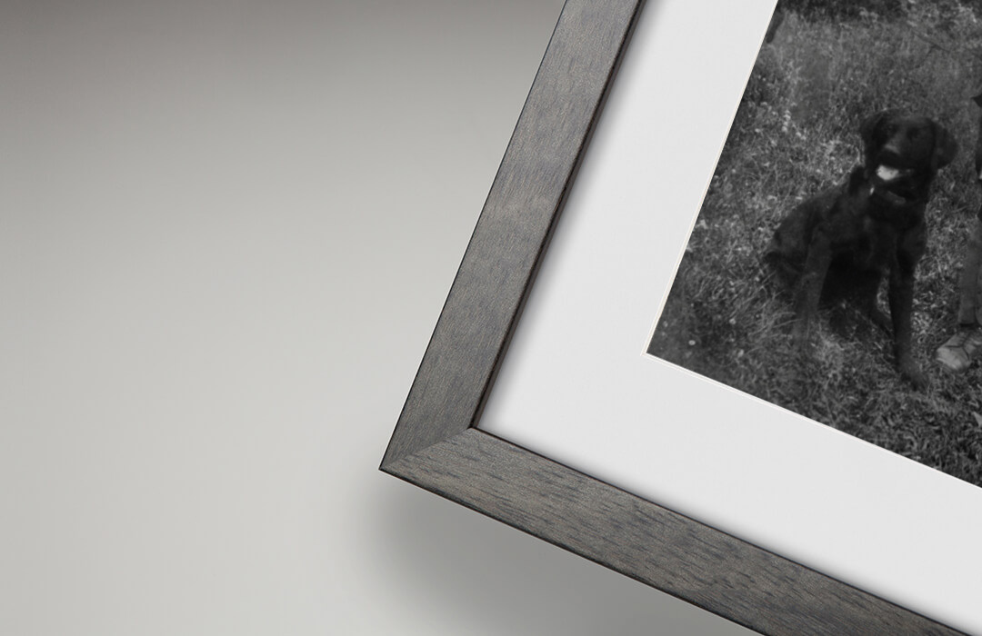 Charcoal frame detail with restored photograph