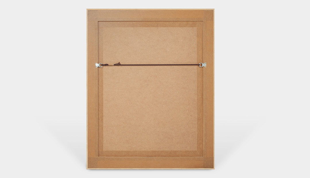 Rear of a frame showing taped edges, eyelets and standard hanging cord